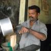 A man making tea at tea stall in Pammal,Chennai...