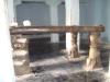 A side shot of three legs cot in Lakshmi Narasimha Temple
