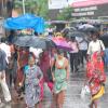 People Walking with Umbrellas In Madurai