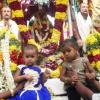 Two Kids Sit in St Paul Peter Chariot at Mylapuram